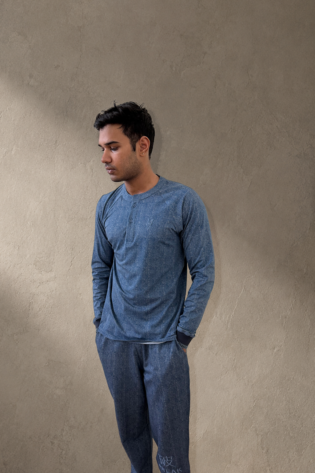Three-quarter view of Kyntsugi Herringbone Henley