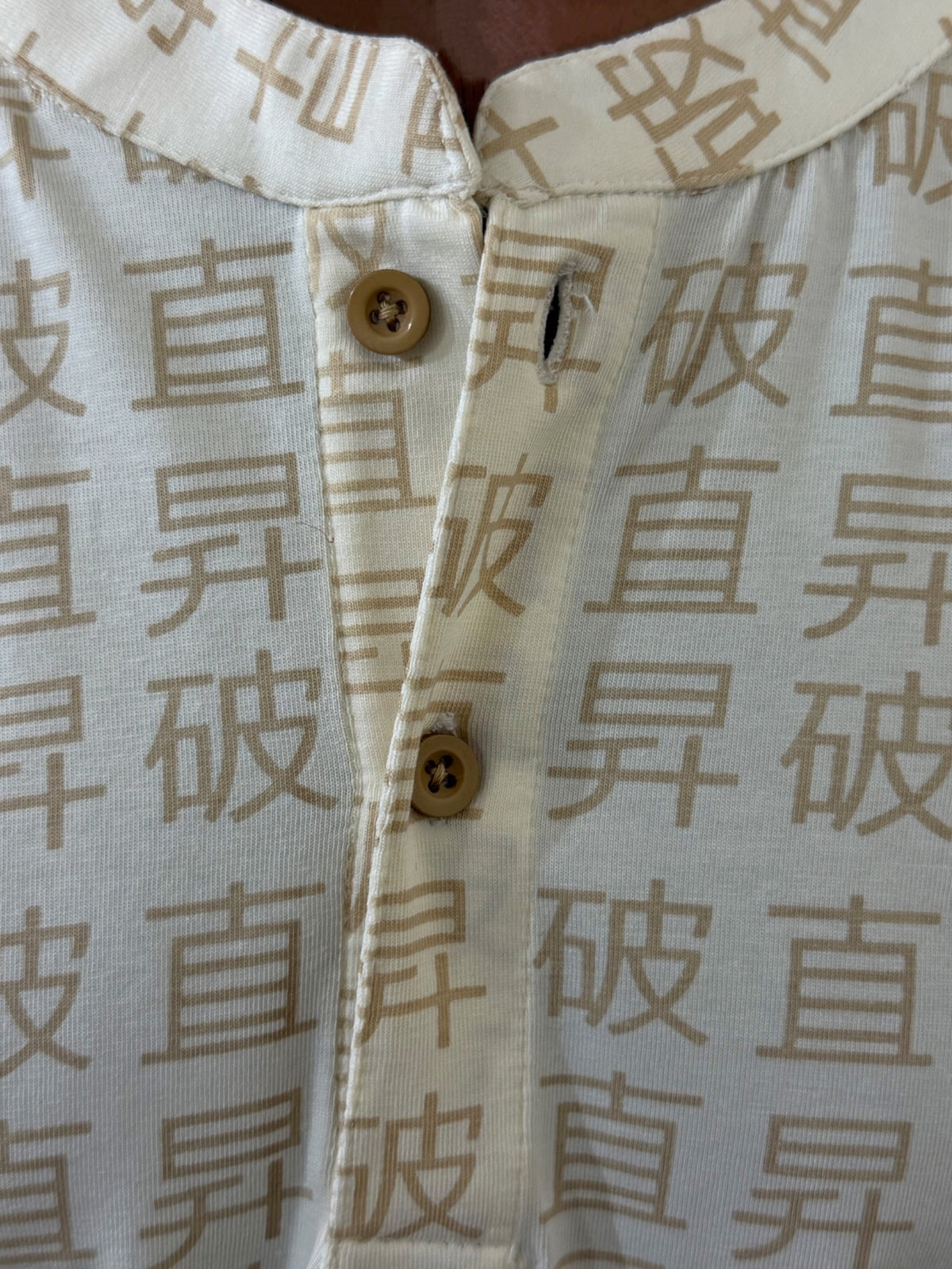 JSYM Henley cuff detail